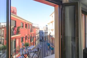 a view from a window of a balcony with chairs at BET Apartments - Tramontana Apartments in Valencia