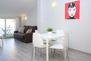 a living room with a white table and chairs at BET Apartments - Tramontana Apartments in Valencia