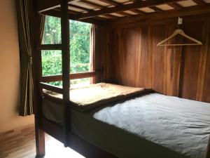 Postel nebo postele na pokoji v ubytování WW Backpackers