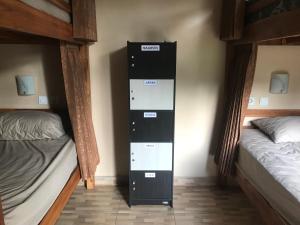 Postel nebo postele na pokoji v ubytování WW Backpackers
