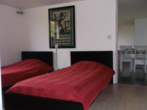 Postel nebo postele na pokoji v ubytování B&B De Vlaschaerd