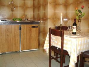 A kitchen or kitchenette at Rantos Apartments