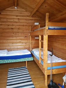 Postel nebo postele na pokoji v ubytování Saltdal Turistsenter