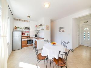 Kuchyň nebo kuchyňský kout v ubytování Apartments Villa Diha