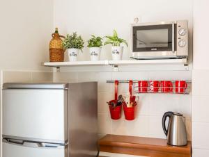 Kuchyň nebo kuchyňský kout v ubytování Apartments Villa Diha