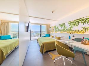 Voodi või voodid majutusasutuse Bluesun hotel Berulia toas