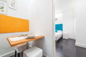 Postel nebo postele na pokoji v ubytování Sorrento Apartments One