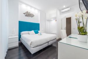 Postel nebo postele na pokoji v ubytování Sorrento Apartments One