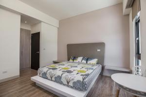 Postel nebo postele na pokoji v ubytování 917 Homestay