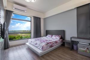 Postel nebo postele na pokoji v ubytování 917 Homestay