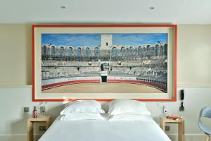 Postel nebo postele na pokoji v ubytování Hotel Spa Le Calendal