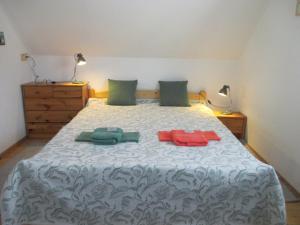 Ein Bett oder Betten in einem Zimmer der Unterkunft Zrub pri Jazierku