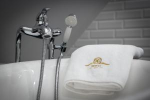 Koupelna v ubytování HG Hotel + 21 fotografií