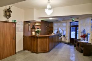 Lobby alebo recepcia v ubytovaní Pensjonat Leśniczówka