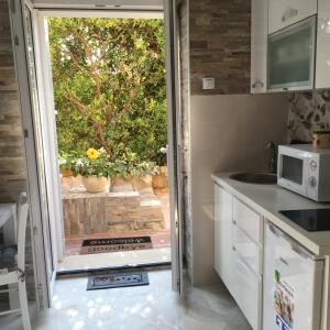 Kuchyňa alebo kuchynka v ubytovaní Apartment Nikka