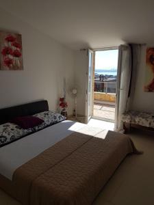 Posteľ alebo postele v izbe v ubytovaní Apartment Dijana