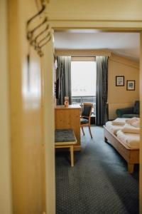 Posteľ alebo postele v izbe v ubytovaní Familiengut Hotel Burgstaller