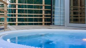 Bazén v ubytovaní Ecosuite & SPA alebo v jeho blízkosti