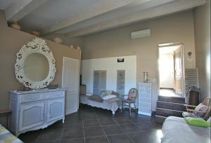 Postel nebo postele na pokoji v ubytování La Bastide des Sources