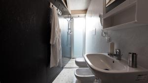 Vannituba majutusasutuses Ecosuite & SPA