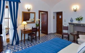 Postel nebo postele na pokoji v ubytování Hotel Villa Cimbrone