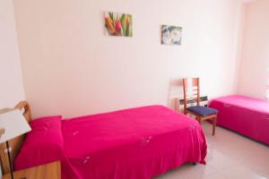 Postel nebo postele na pokoji v ubytování Santa Eulalia IBERPLAYA