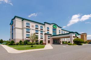 a rendering of a hotel building at Wingate by Wyndham Vineland in Vineland