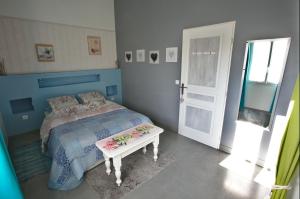 Postel nebo postele na pokoji v ubytování La Bastide des Sources