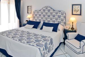 Postel nebo postele na pokoji v ubytování Hotel Villa Cimbrone