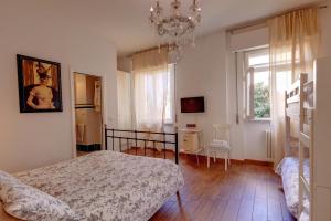 Postel nebo postele na pokoji v ubytování Cento Passi dal Duomo B&B