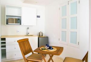A kitchen or kitchenette at Bequia Plantation Hotel