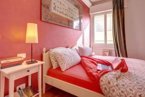 Postel nebo postele na pokoji v ubytování Cento Passi dal Duomo B&B