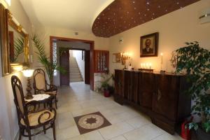 a living room with a hallway with a table and chairs at Eurobaltyk in Rewal