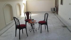 Posezení v ubytování Pamposh Guest House, Gurgaon