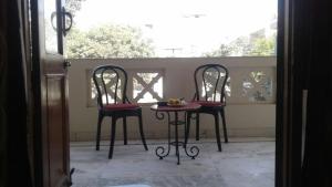 Balkón nebo terasa v ubytování Pamposh Guest House, Gurgaon