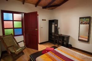 Postel nebo postele na pokoji v ubytování Casa Hospedaje La Bohemia