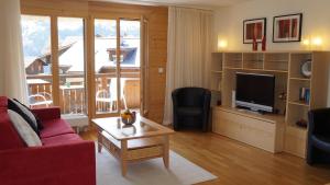 TV a/nebo společenská místnost v ubytování Chalet Bella Vista 3