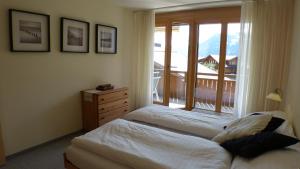 Postel nebo postele na pokoji v ubytování Chalet Bella Vista 3