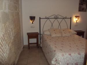 Postel nebo postele na pokoji v ubytování Hostal Fenix