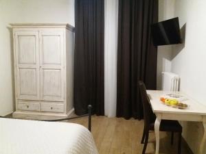 Postel nebo postele na pokoji v ubytování B&B LEI