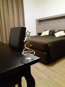 Postel nebo postele na pokoji v ubytování B&B LEI