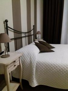Postel nebo postele na pokoji v ubytování B&B LEI