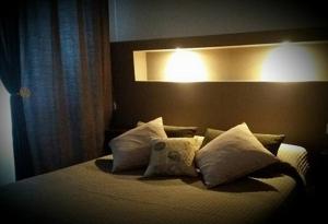 Postel nebo postele na pokoji v ubytování B&B LEI