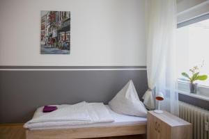 Un pat sau paturi într-o cameră la Apartment Widey Str. 52