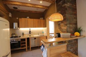Kuchyň nebo kuchyňský kout v ubytování Ferienhaus Lüneburg + 15 fotografií