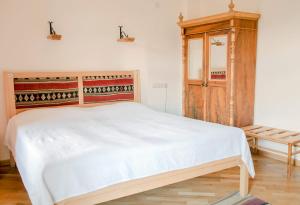 Postel nebo postele na pokoji v ubytování Hotel Mirhav