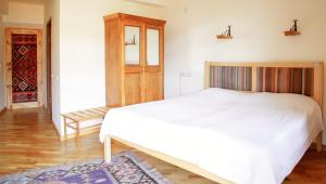 Postel nebo postele na pokoji v ubytování Hotel Mirhav