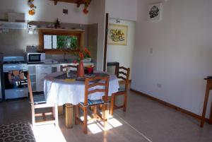 A cozinha ou cozinha compacta de Cabañas Normana Inn
