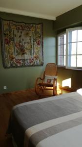 Ένα ή περισσότερα κρεβάτια σε δωμάτιο στο Gite Maison Narbay