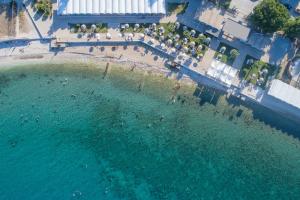 an aerial view of a pool of water with a beach at Strada Marina Hotel in Zakynthos